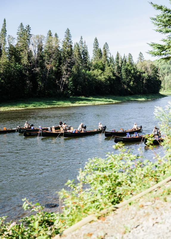 a line up of boats at larrys gulch fishing lodge